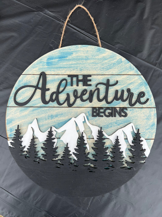The Adventure Begins Sign